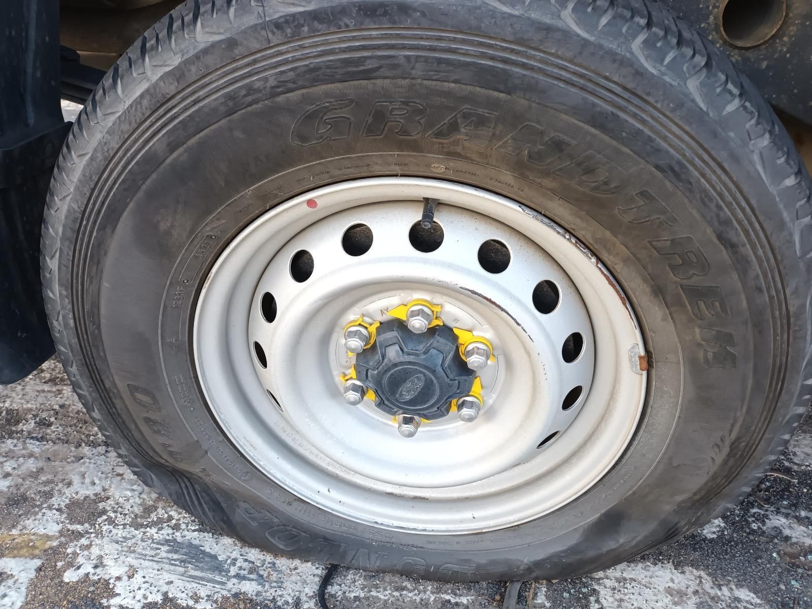A Close Up of a Car Tire with a Metal Rim — South West 4WD Wreckers in Harristown, QLD