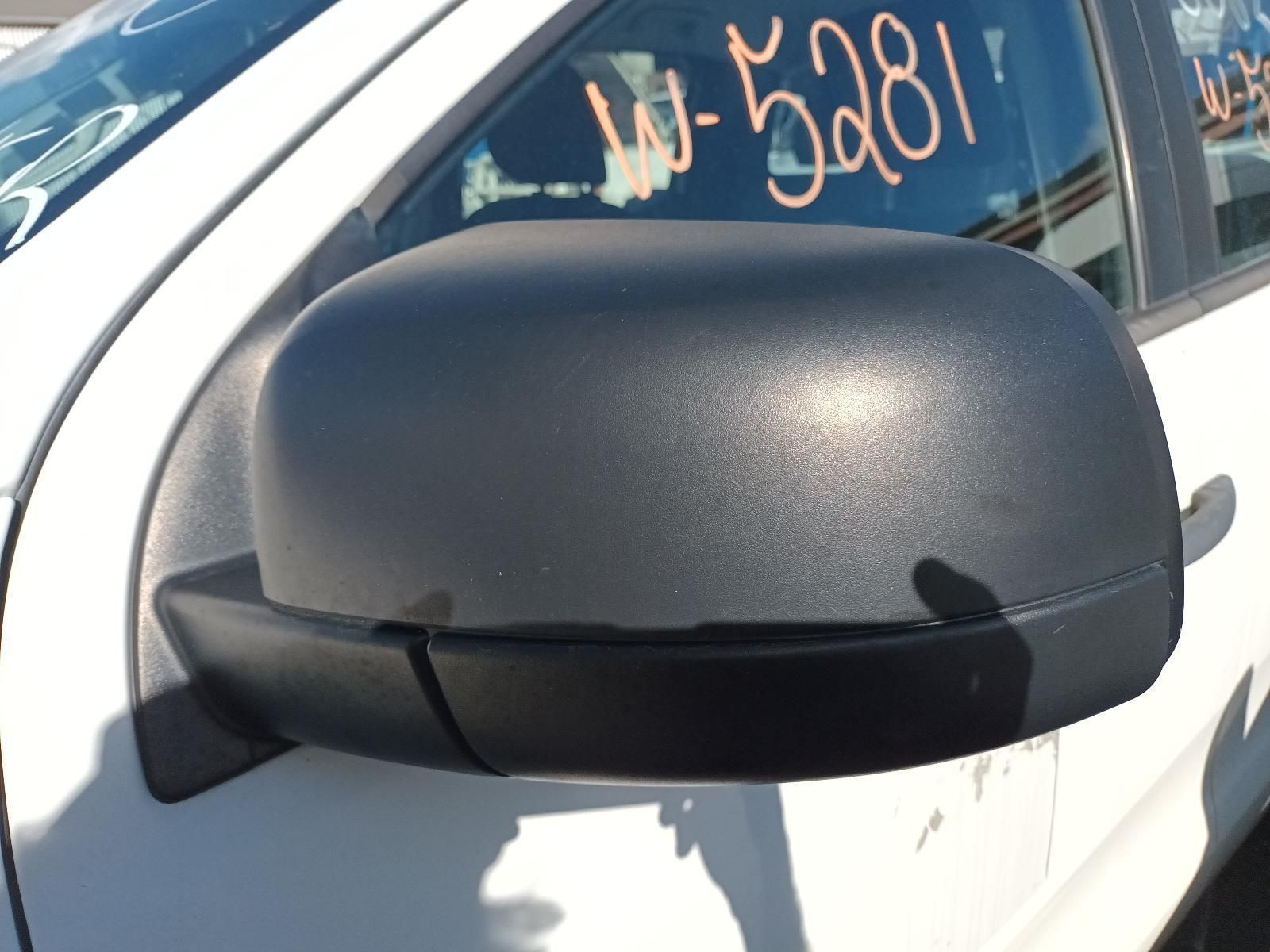 A Close Up of a Side View Mirror on a White Car — South West 4WD Wreckers in Harristown, QLD