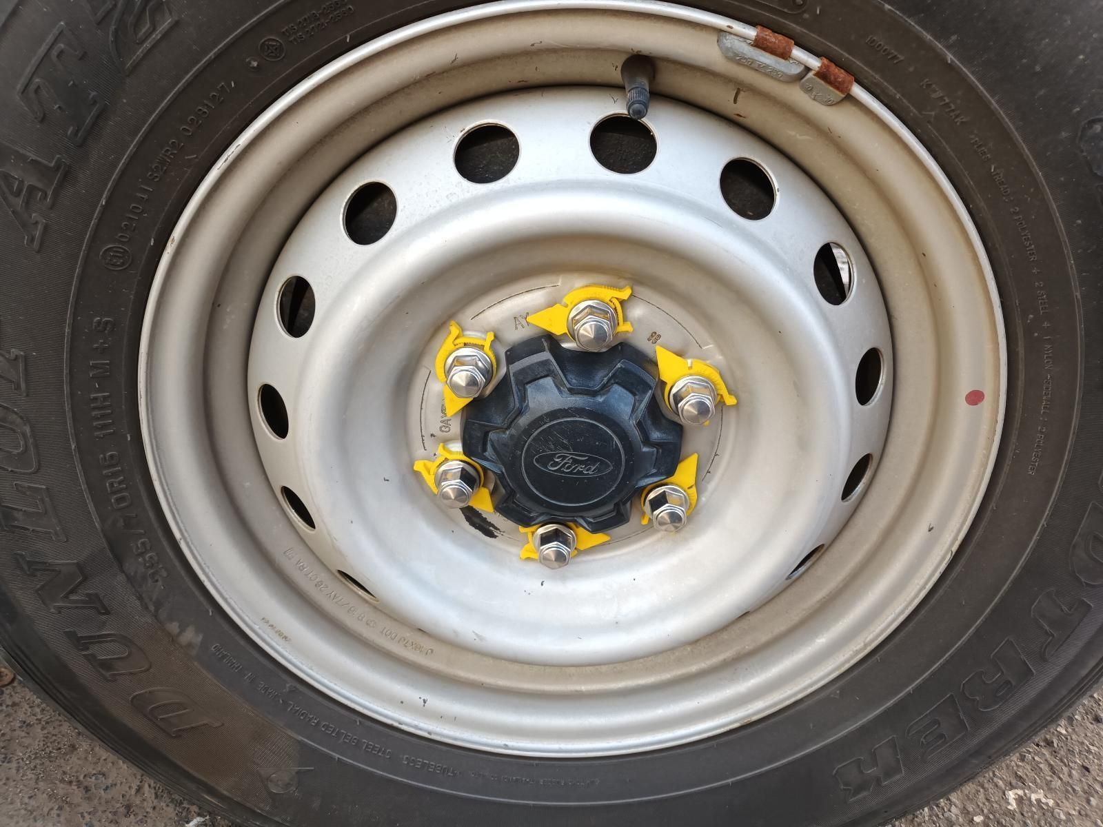 A Close Up of a Car Wheel with a Yellow Hubcap — South West 4WD Wreckers in Harristown, QLD