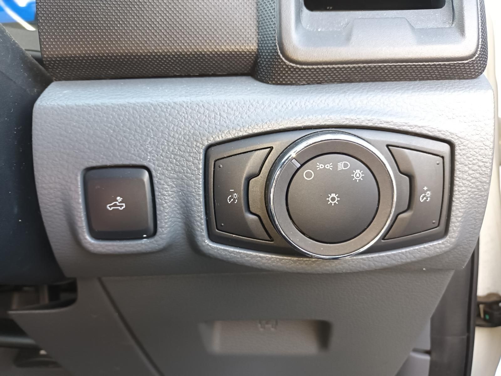 A Close Up of a Car's Dashboard with a Light Switch and a Button — South West 4WD Wreckers in Harristown, QLD