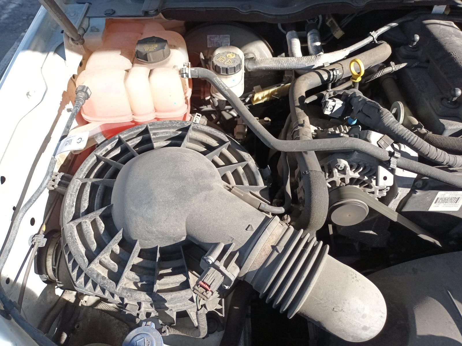 A Close Up of the Engine of a White Car — South West 4WD Wreckers in Harristown, QLD