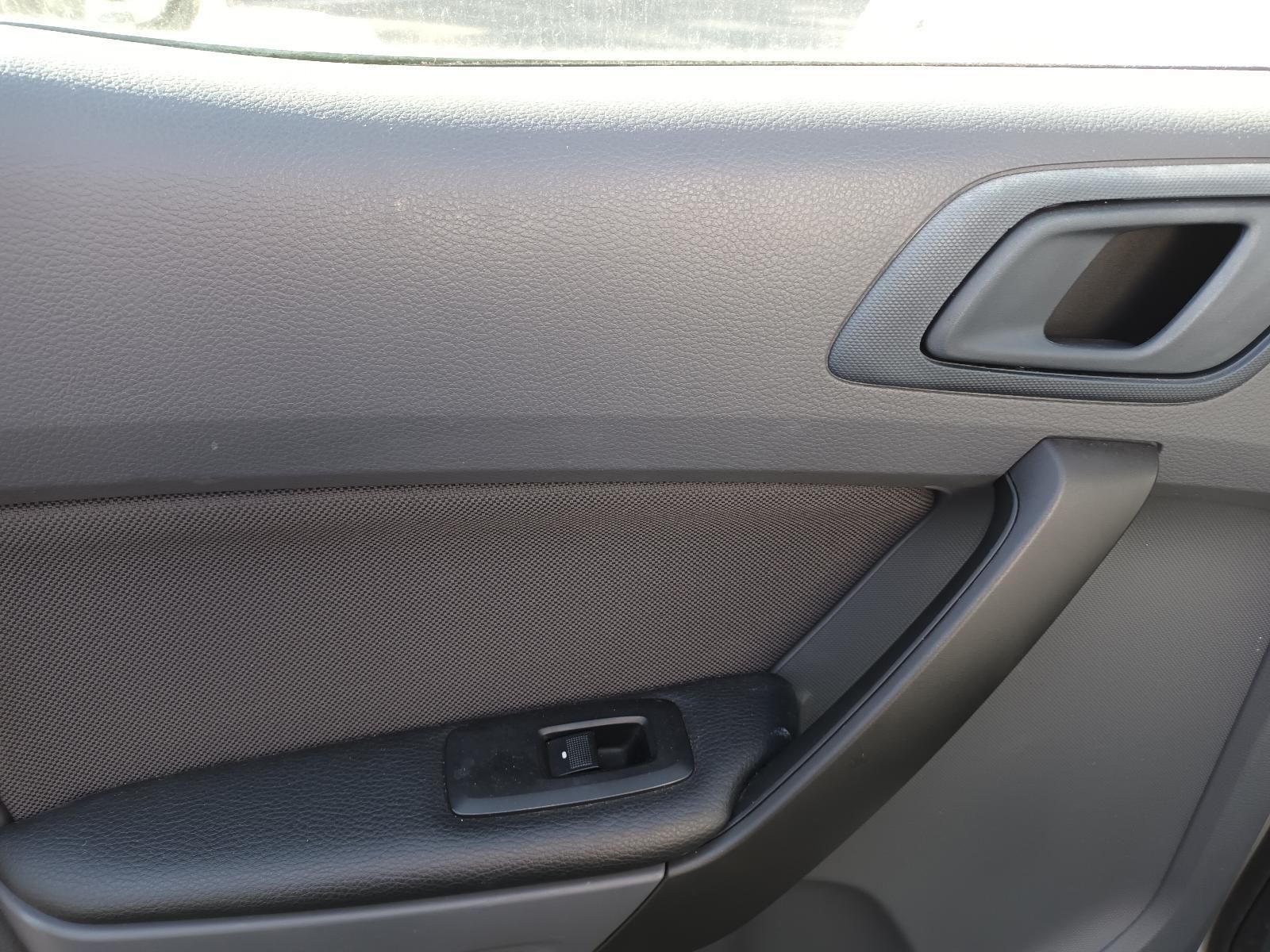 A Close Up of a Car Door with a Window Switch — South West 4WD Wreckers in Harristown, QLD