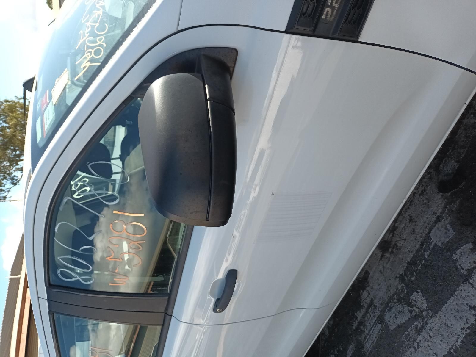 A White Car is Parked on the Side of the Road — South West 4WD Wreckers in Harristown, QLD
