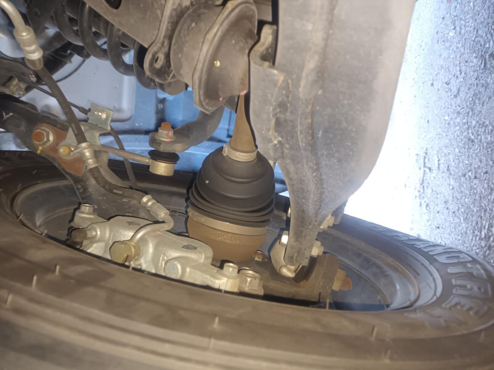 A Close Up of a Car 's Suspension and a Tire — South West 4WD Wreckers in Harristown, QLD