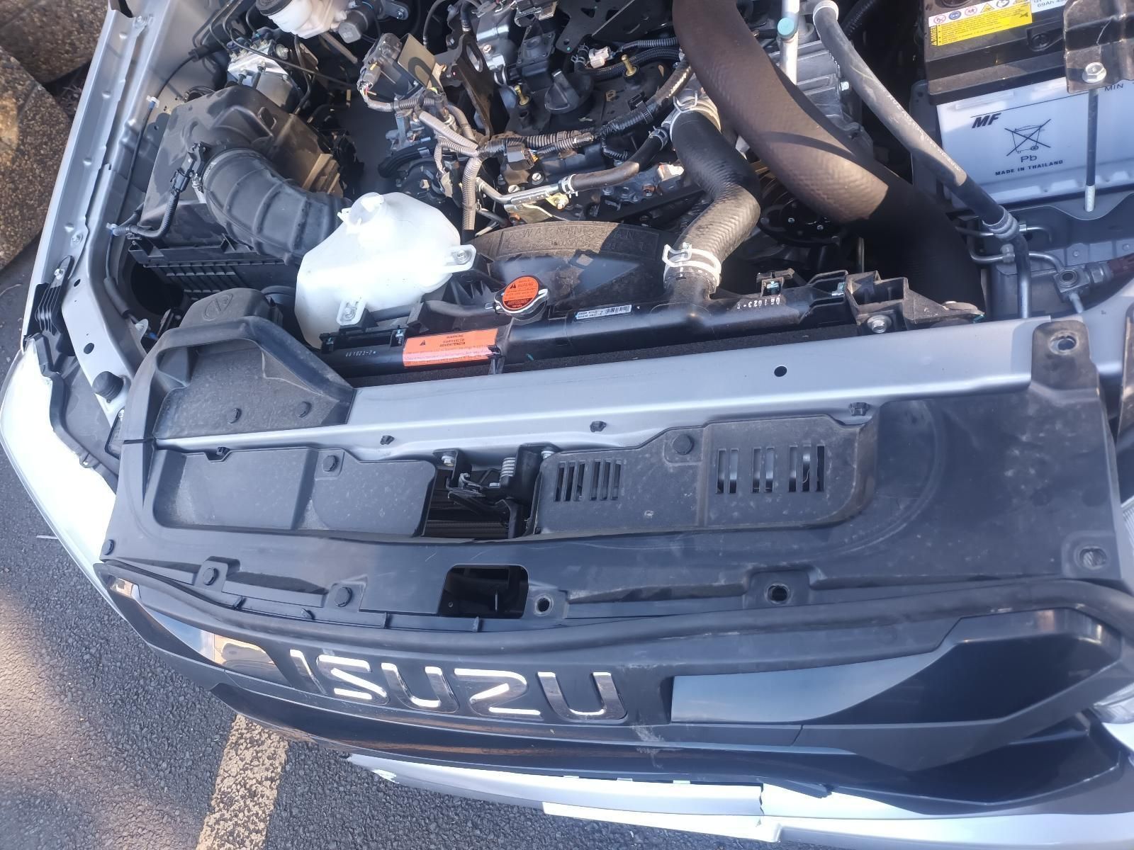 The Hood of an Isuzu Car is Open and Shows the Engine — South West 4WD Wreckers in Harristown, QLD