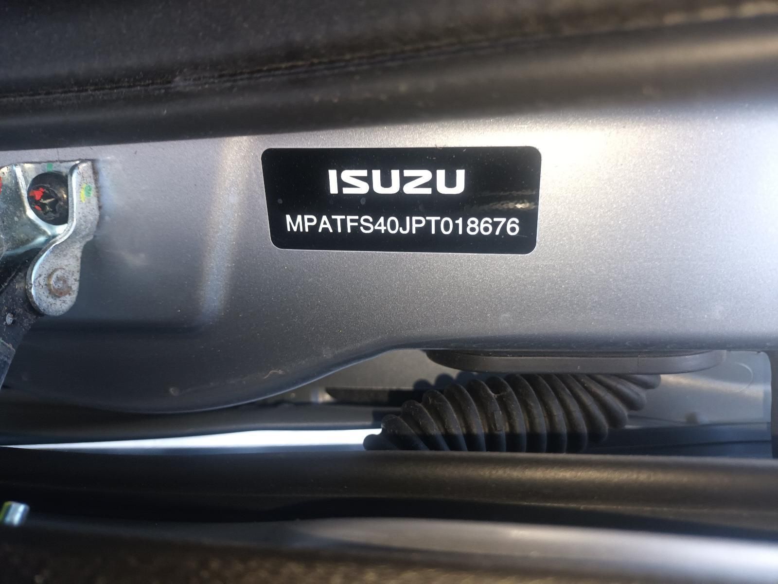 A Close Up of a Sticker on the Side of a Car That Says Isuzu — South West 4WD Wreckers in Harristown, QLD
