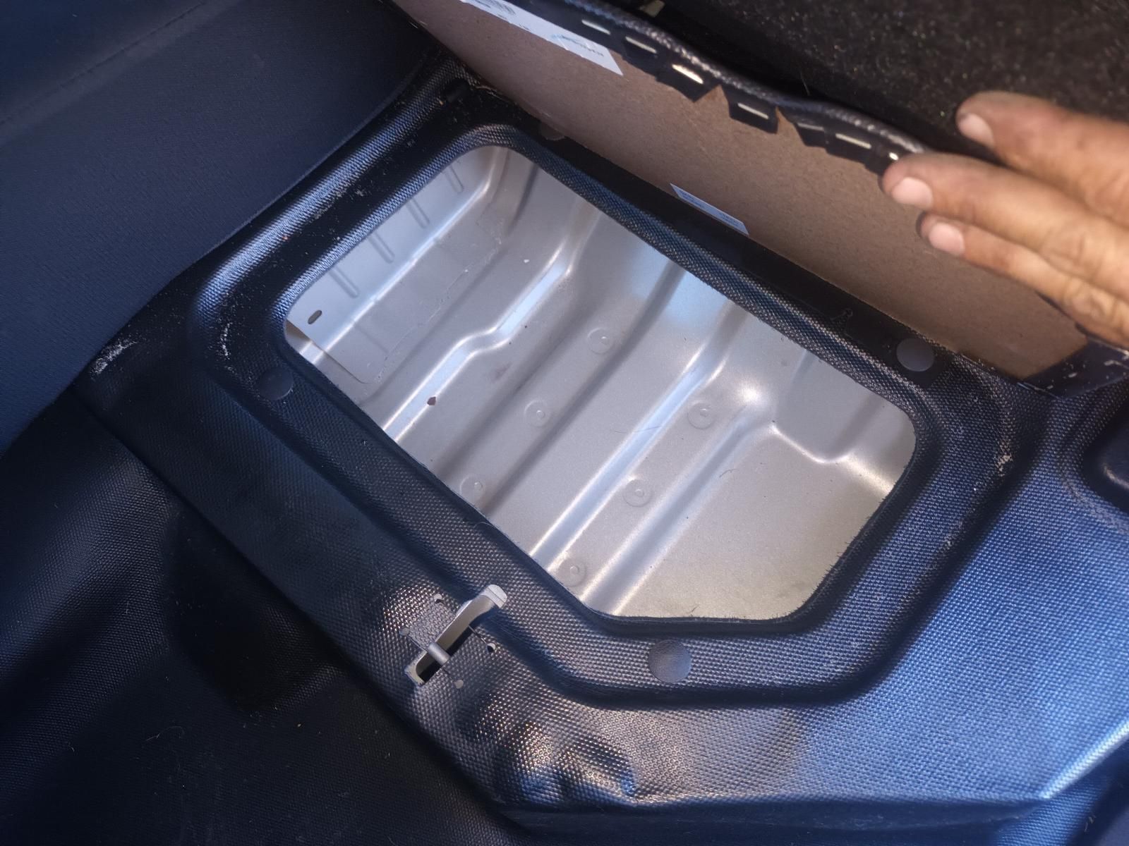 A Person is Opening the Trunk of a Car — South West 4WD Wreckers in Harristown, QLD