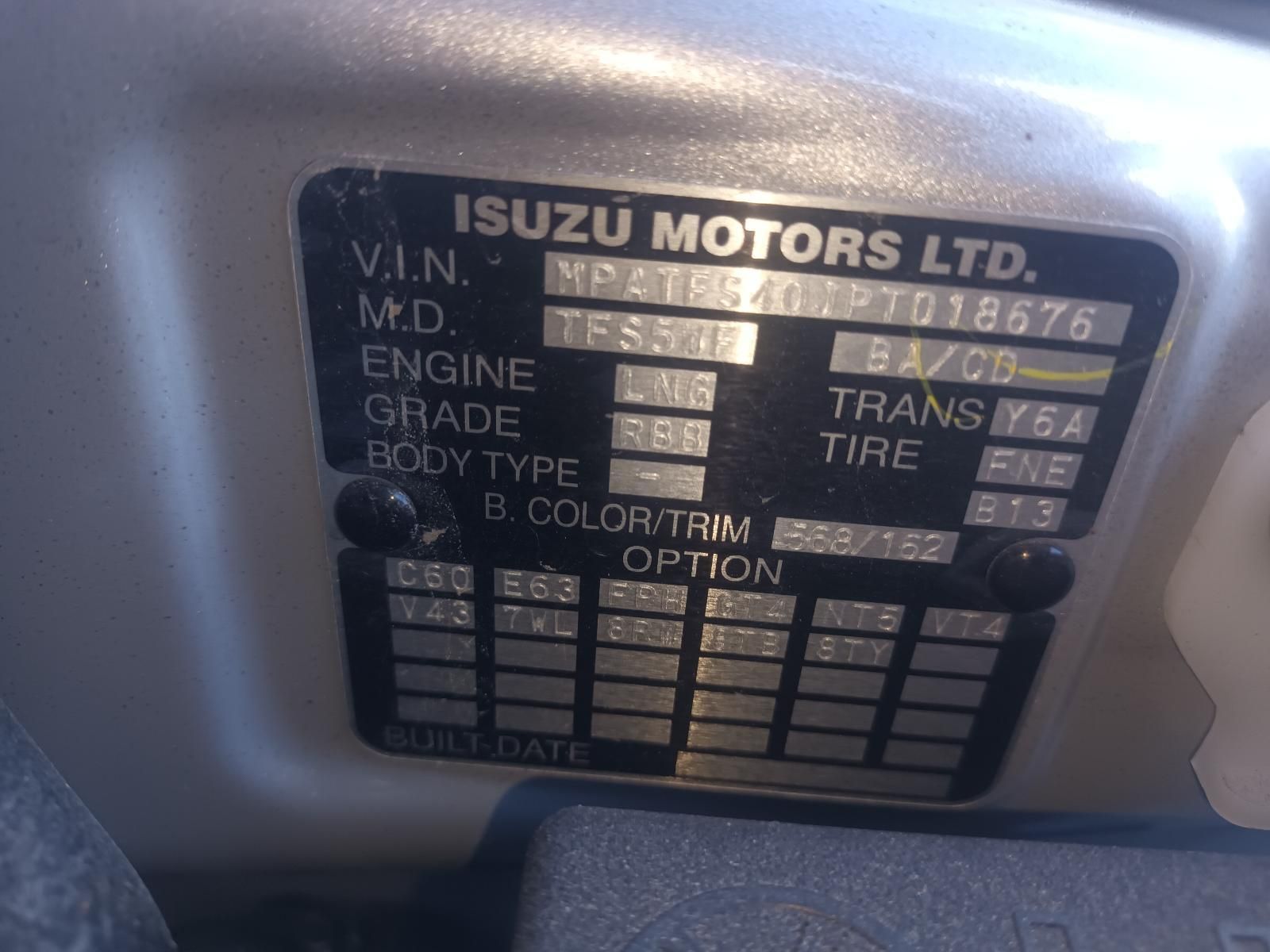 A Close Up of a Isuzu Motors Ltd License Plate — South West 4WD Wreckers in Harristown, QLD