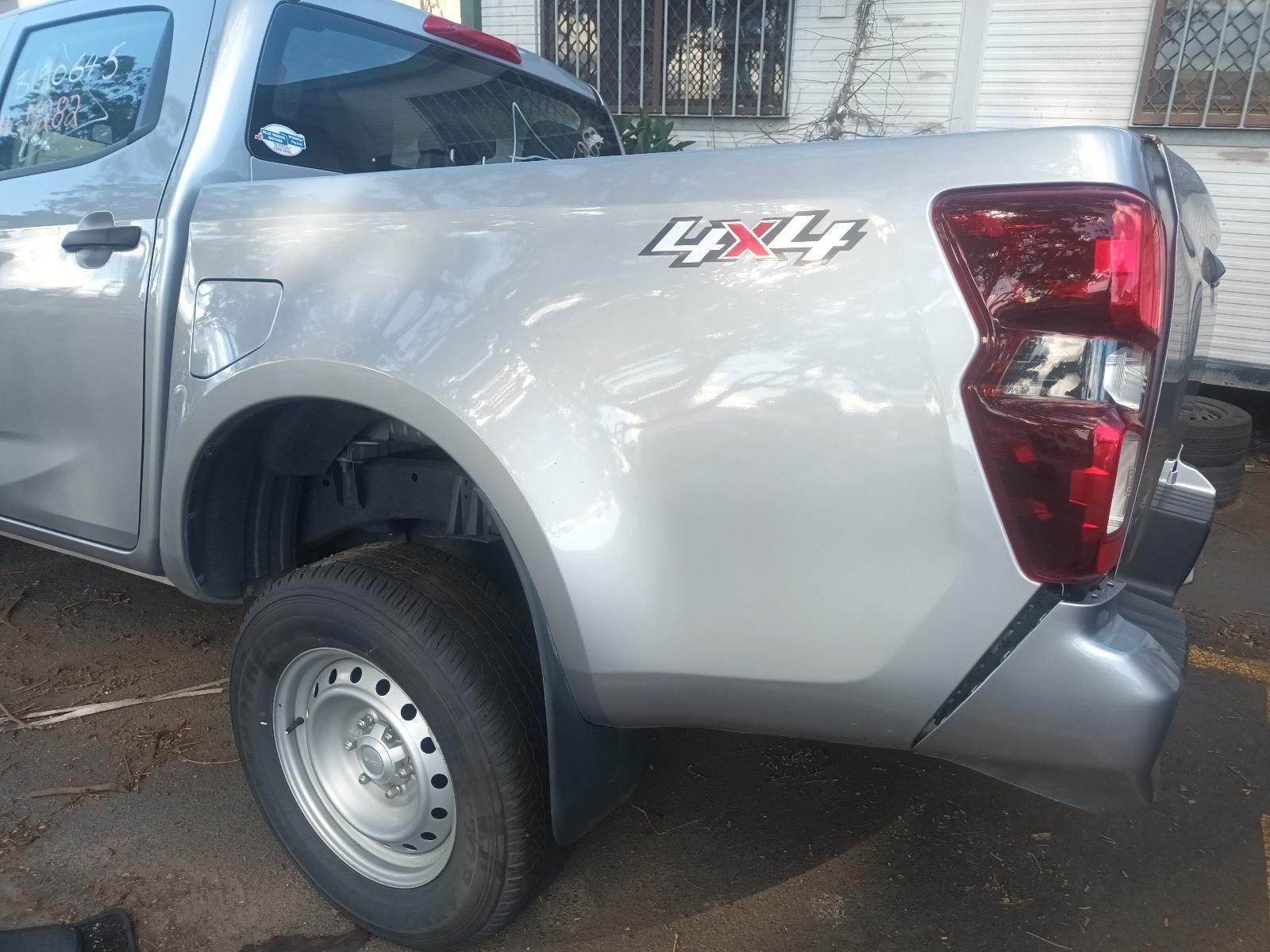 A Silver Pickup Truck is Parked in a Parking Lot — South West 4WD Wreckers in Harristown, QLD