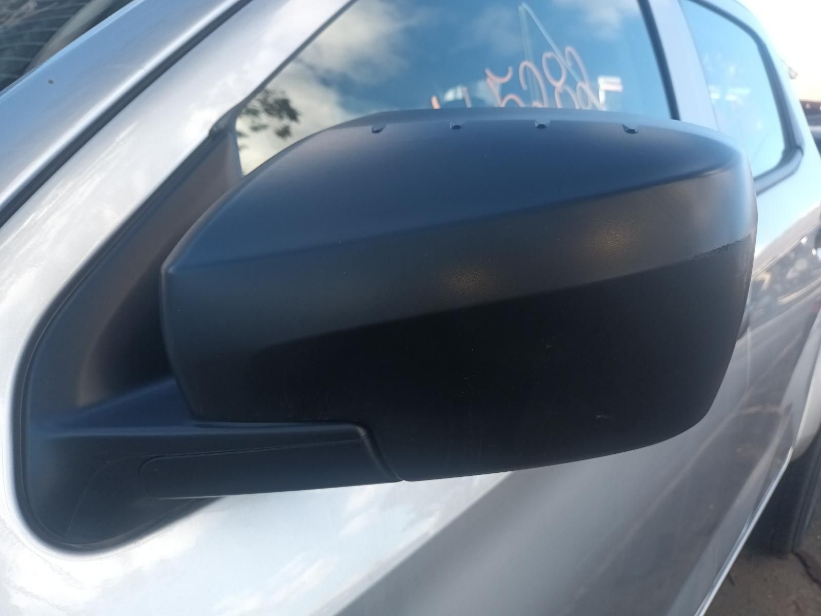 A Close Up of a Side View Mirror on a Silver Car — South West 4WD Wreckers in Harristown, QLD