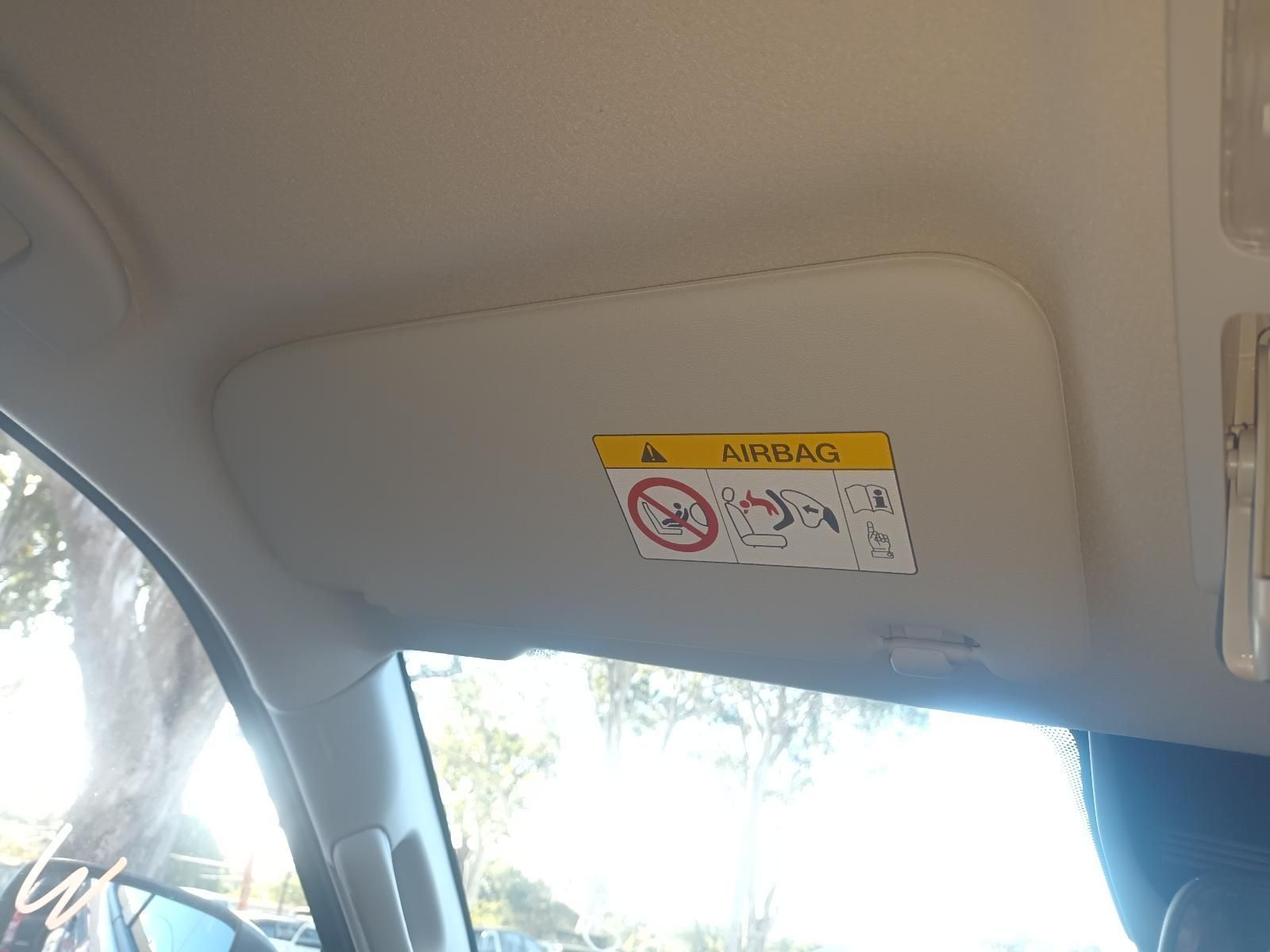 A Car Sun Visor with a Warning Sticker on It. — South West 4WD Wreckers in Harristown, QLD