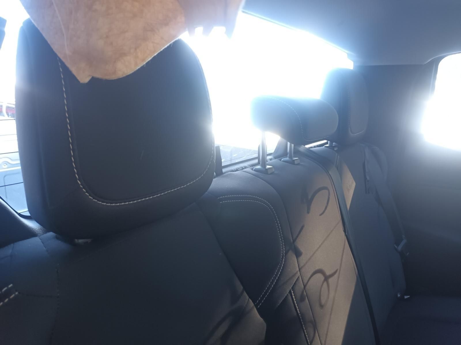 A Person is Sitting in the Back Seat of a Car — South West 4WD Wreckers in Harristown, QLD