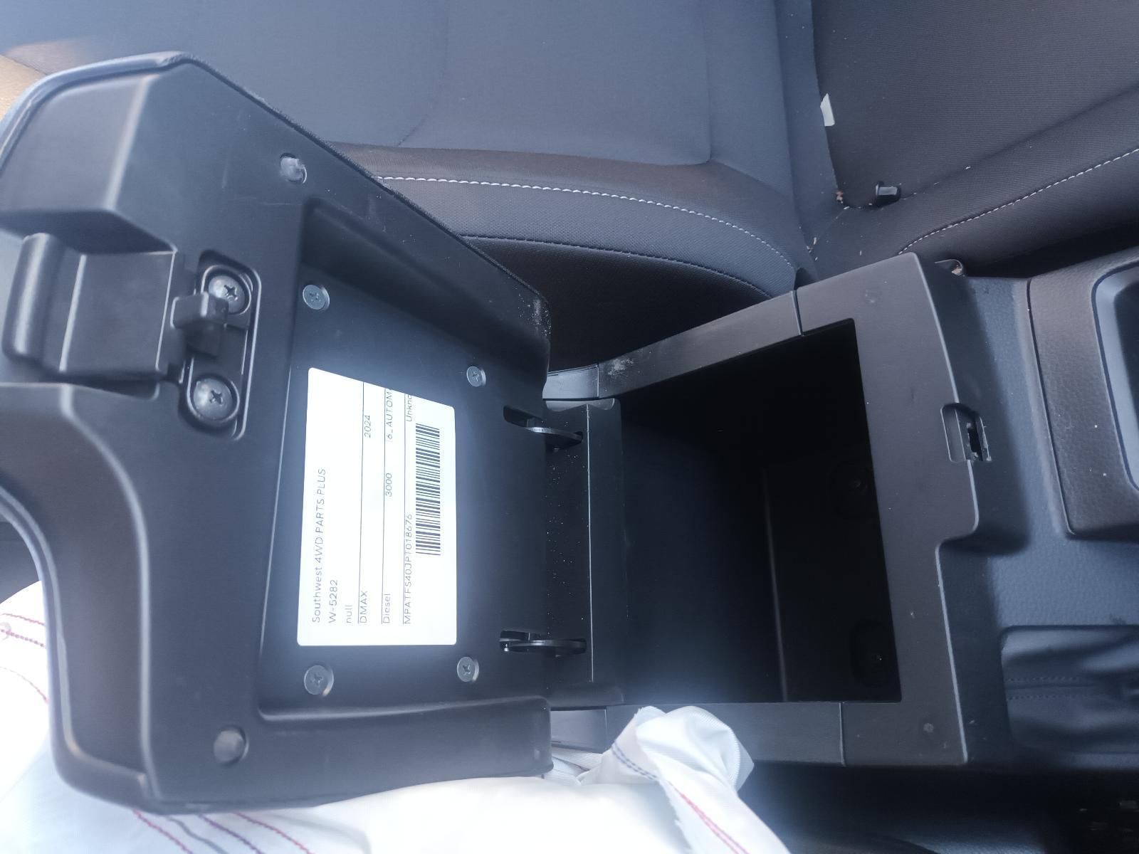 A Black Car Arm Rest with the Lid Open — South West 4WD Wreckers in Harristown, QLD