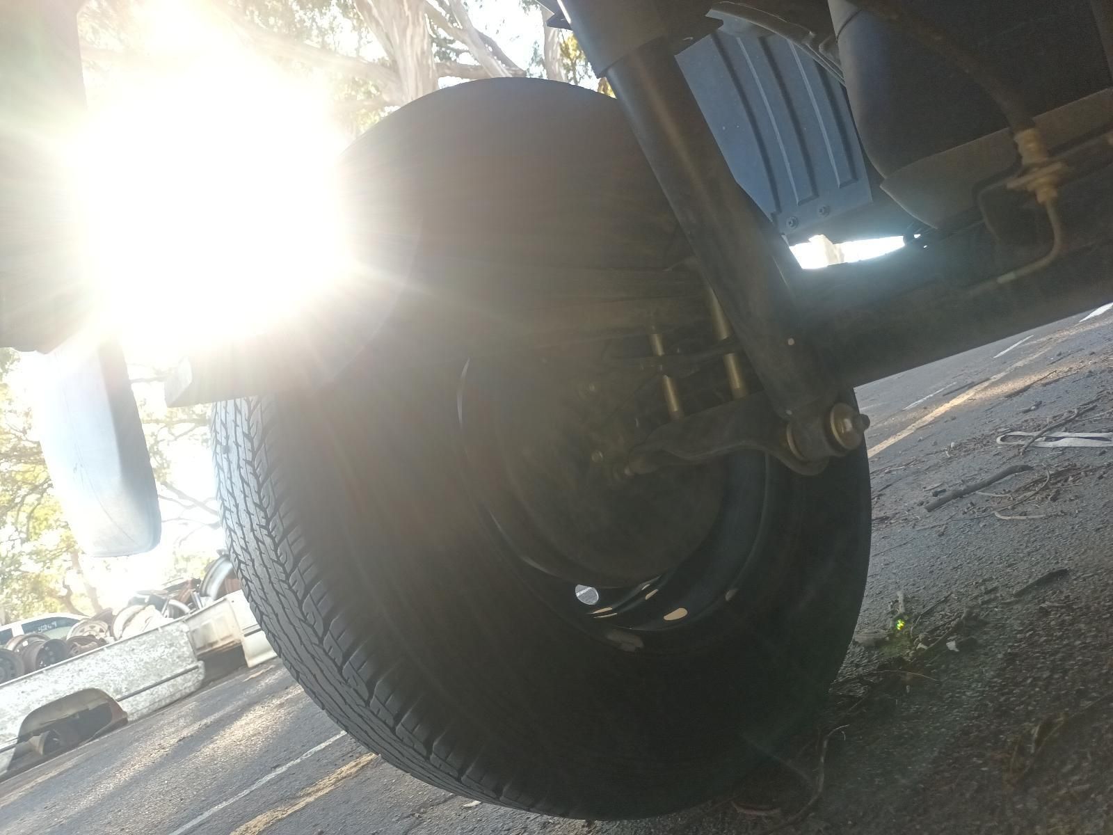 A Close Up of a Motorcycle Wheel on a Street — South West 4WD Wreckers in Harristown, QLD