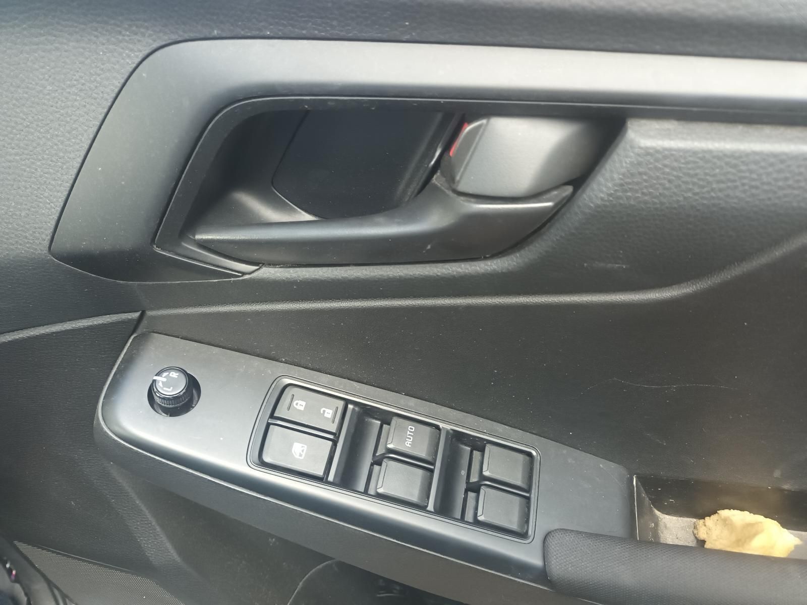 A Close Up of a Car Door with a Few Buttons on It — South West 4WD Wreckers in Harristown, QLD