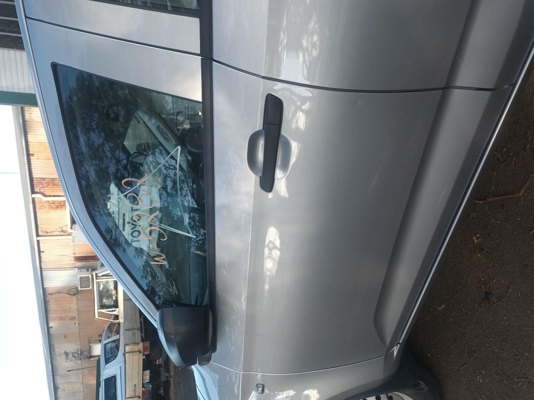 A Silver Car is Parked on the Side of the Road — South West 4WD Wreckers in Harristown, QLD