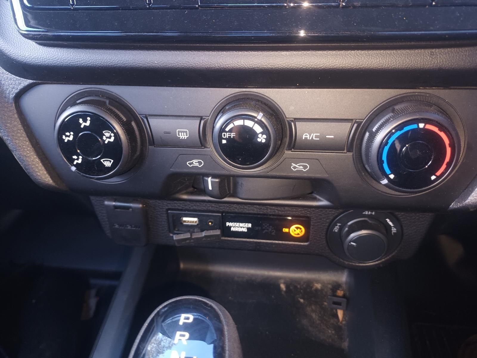 A Close Up of a Car 's A/C Control Panel — South West 4WD Wreckers in Harristown, QLD