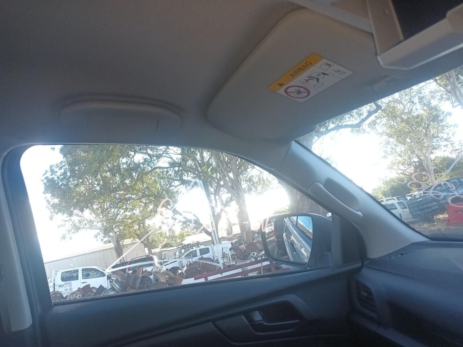 A Car with a Sun Visor That Says Airbag on It — South West 4WD Wreckers in Harristown, QLD