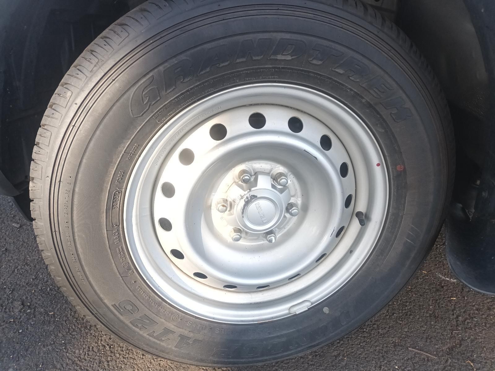 A Close Up of a Car Tire with a Metal Rim — South West 4WD Wreckers in Harristown, QLD