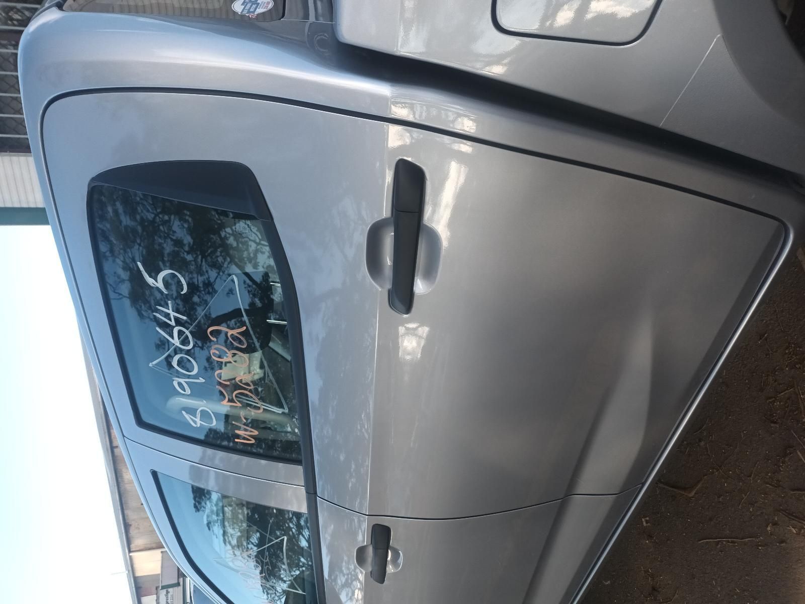 A Silver Car with a Sticker on the Door That Says Ep065 — South West 4WD Wreckers in Harristown, QLD
