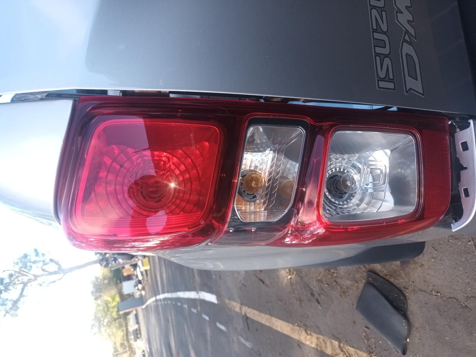 A Close Up of a Car 's Tail Light on the Side of the Road — South West 4WD Wreckers in Harristown, QLD