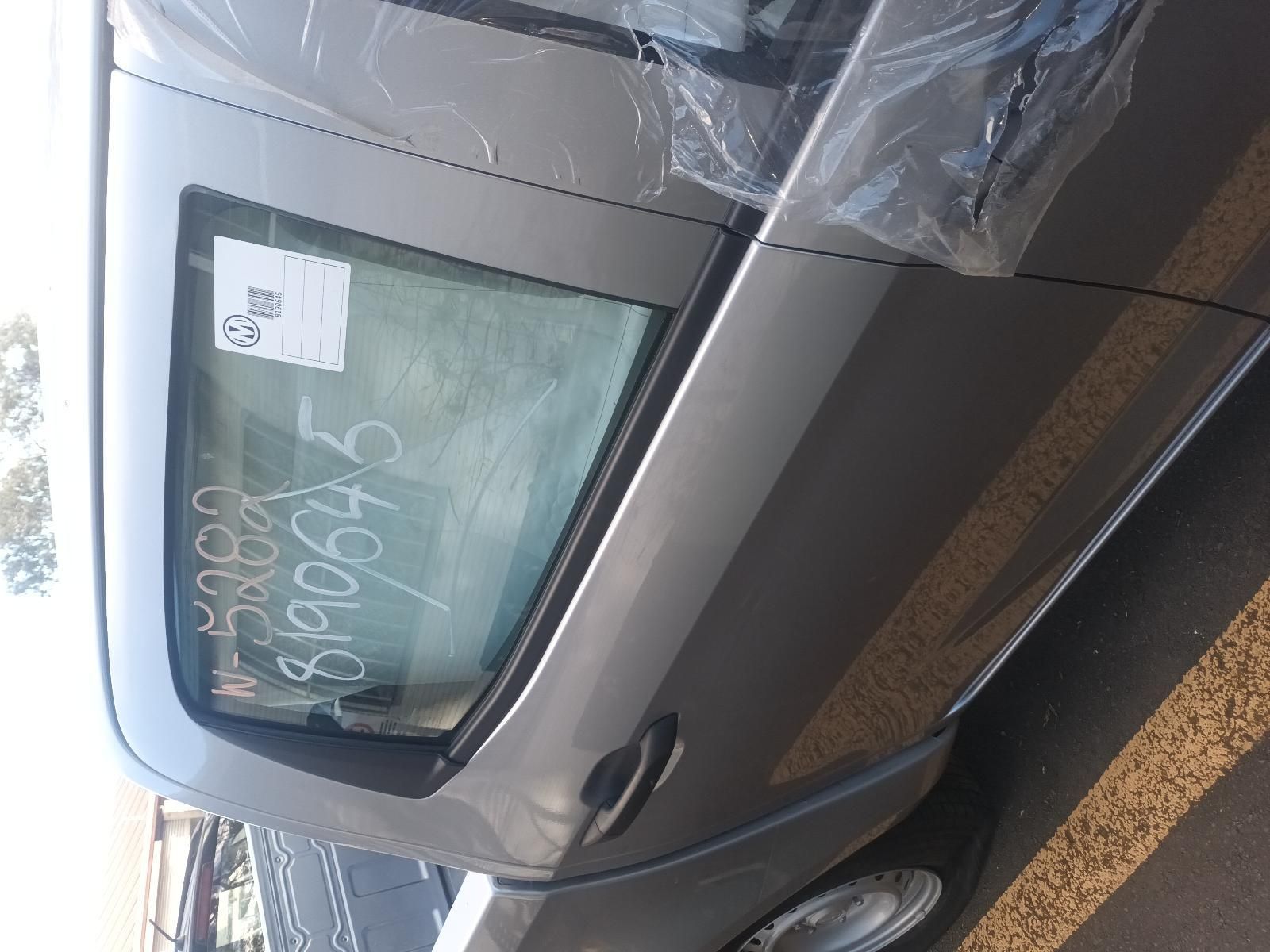 A Car is Wrapped in Plastic and Has a Sticker on the Window — South West 4WD Wreckers in Harristown, QLD