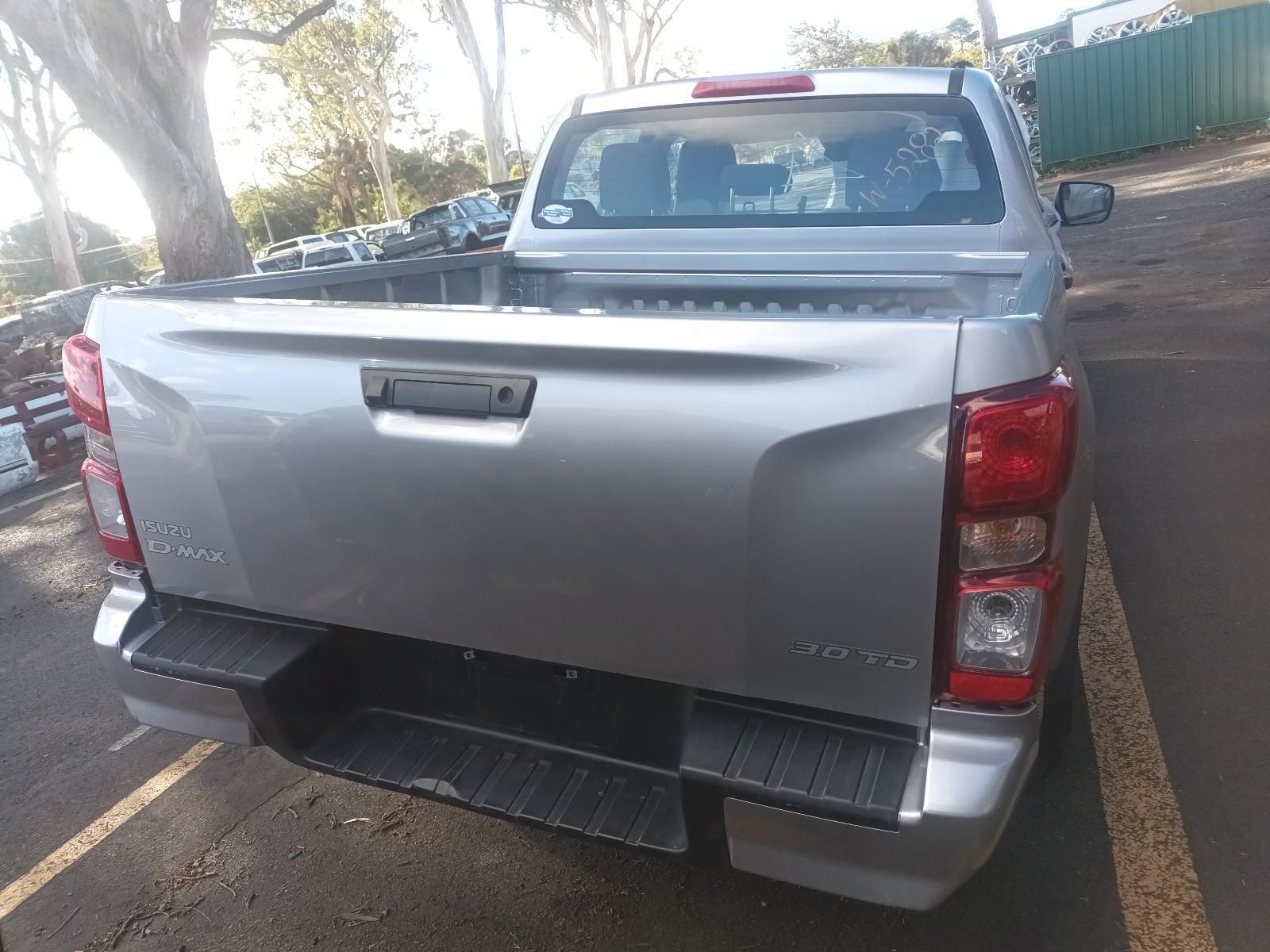 A Silver Pickup Truck is Parked in a Parking Lot — South West 4WD Wreckers in Harristown, QLD