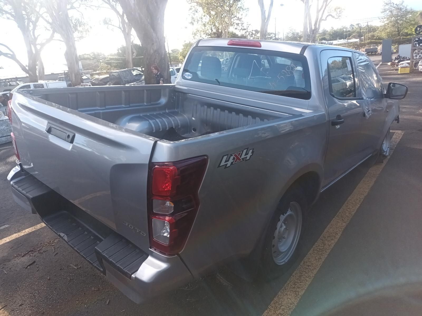 A Silver Pickup Truck is Parked in a Parking Lot — South West 4WD Wreckers in Harristown, QLD