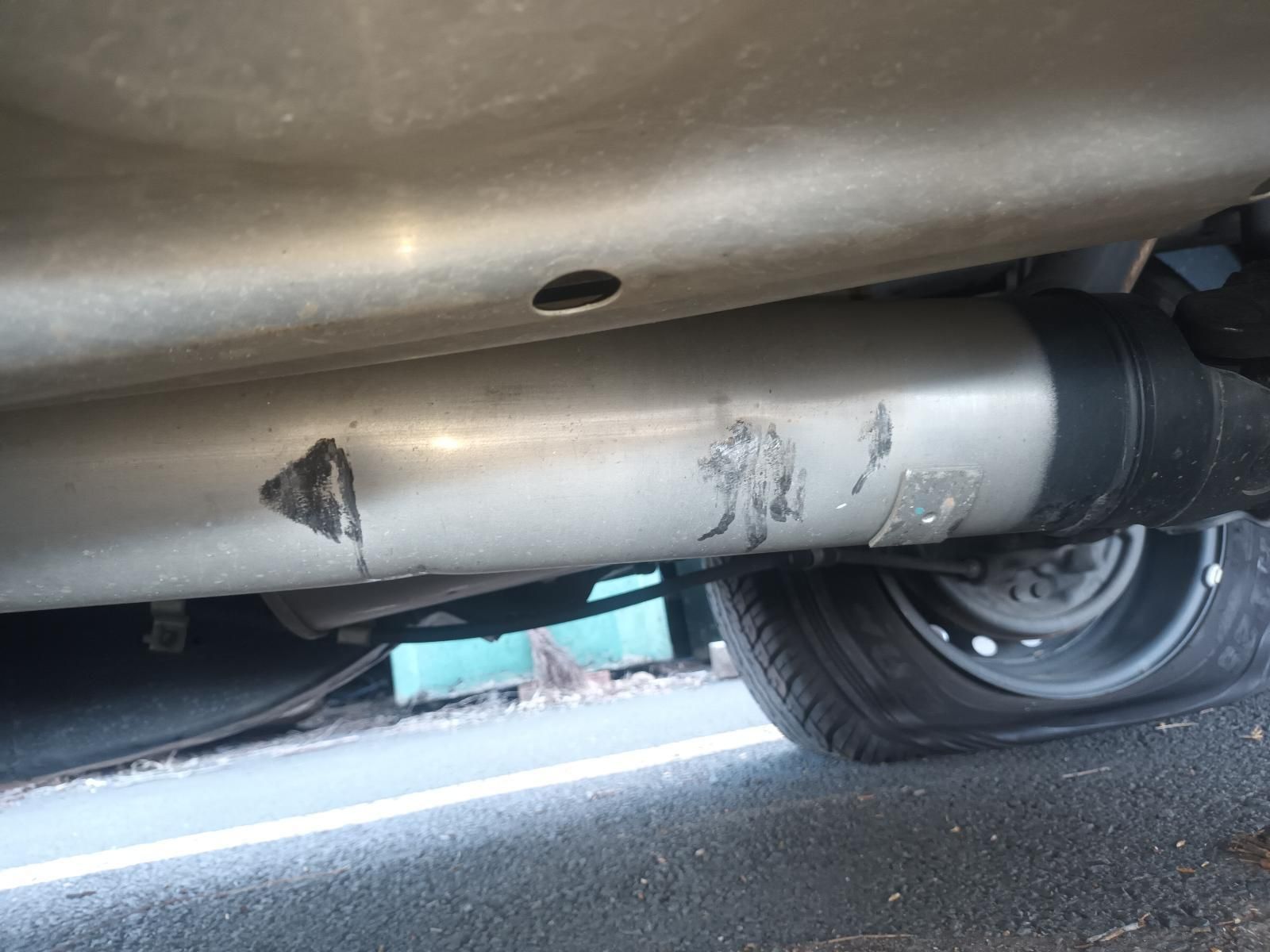 A Close Up of the Underside of a Car with a Flat Tire — South West 4WD Wreckers in Harristown, QLD