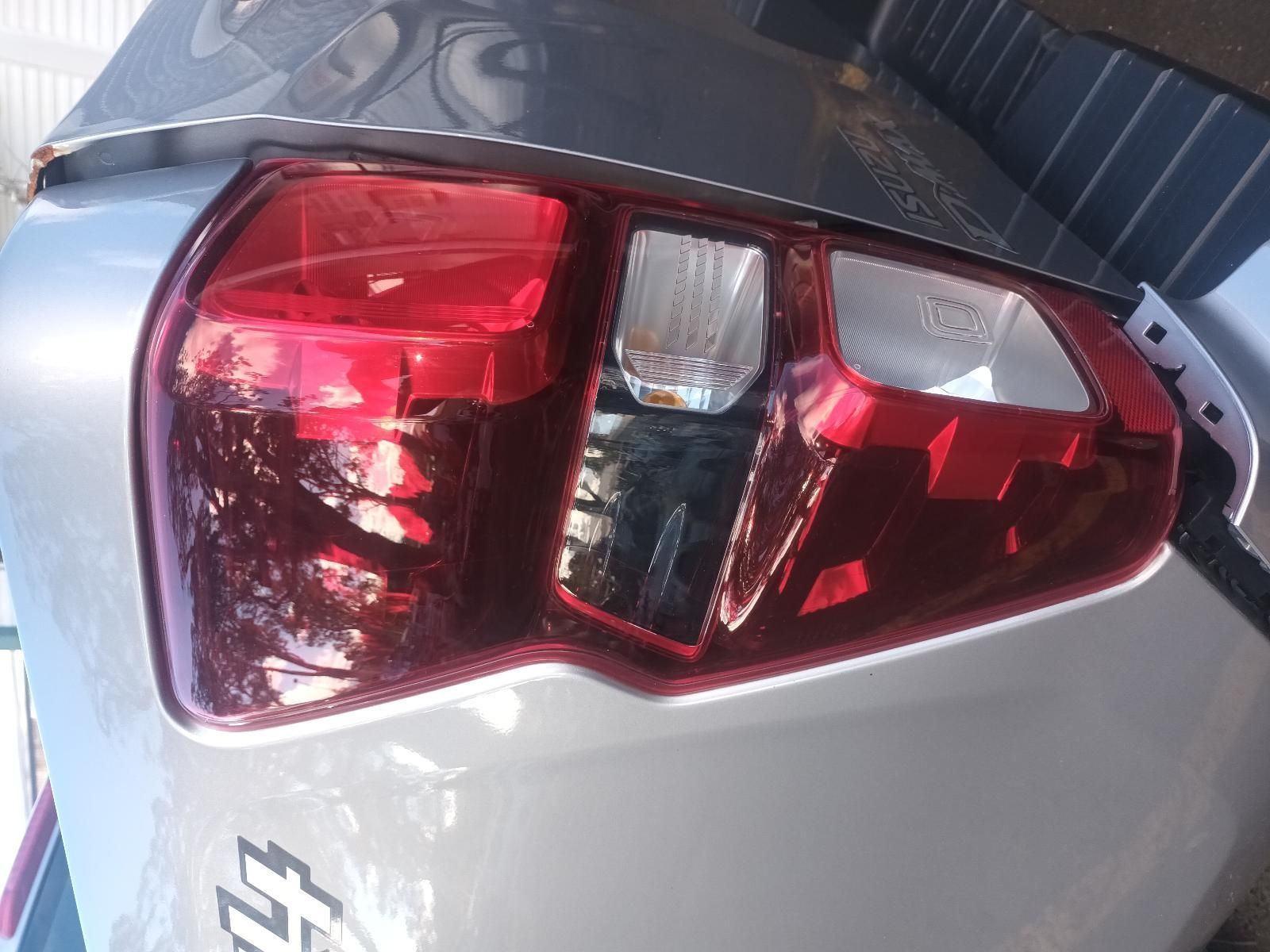 A Close Up of a Silver Car with a Red Tail Light — South West 4WD Wreckers in Harristown, QLD