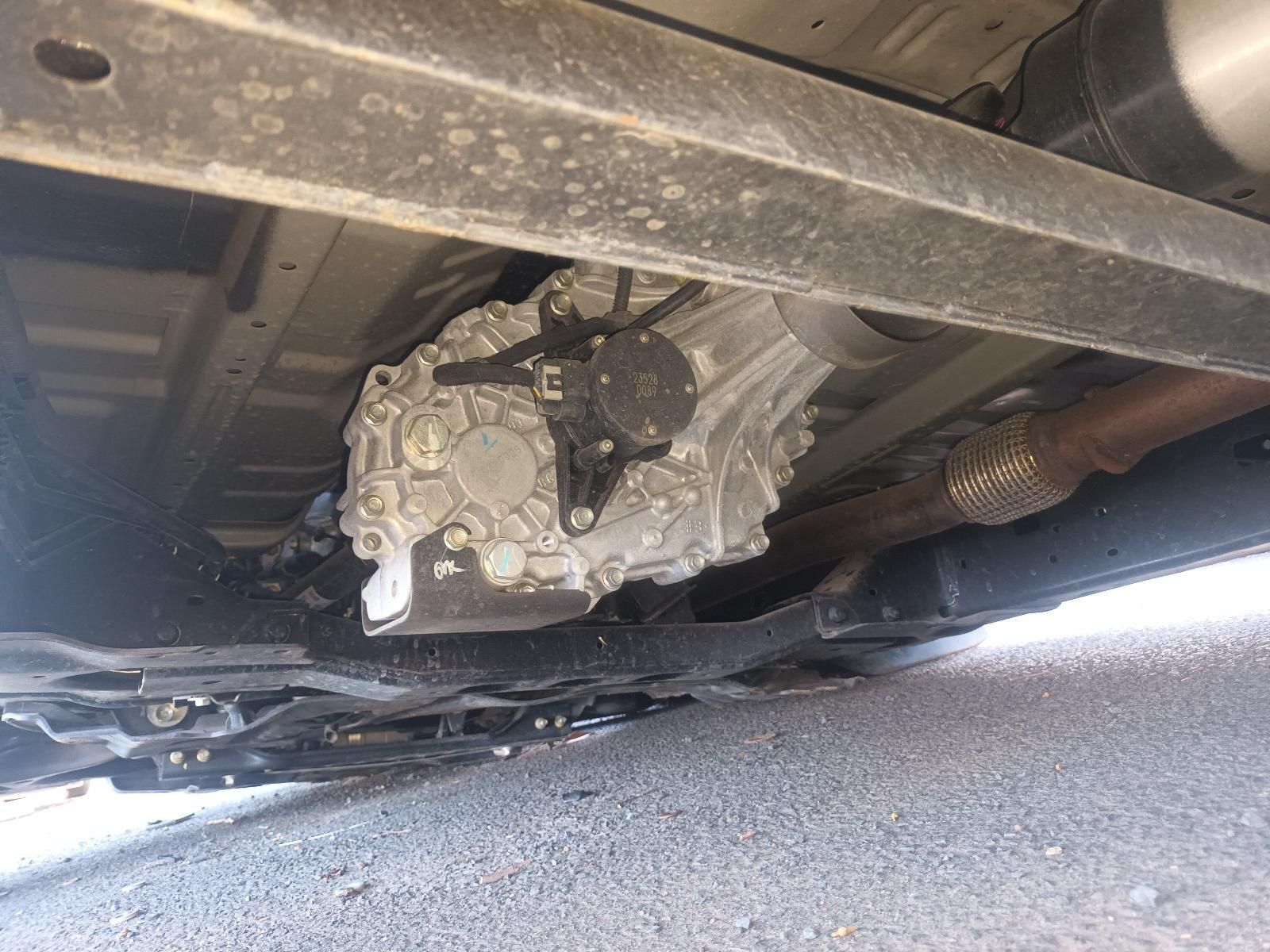 The Underside of a Car with a Gearbox and Exhaust Pipe — South West 4WD Wreckers in Harristown, QLD