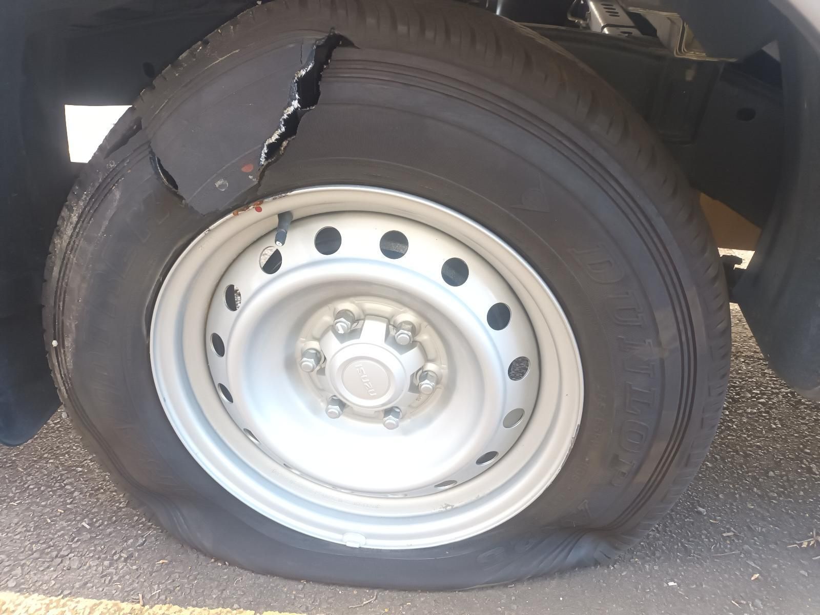 A Close Up of a Flat Tire on a Car — South West 4WD Wreckers in Harristown, QLD