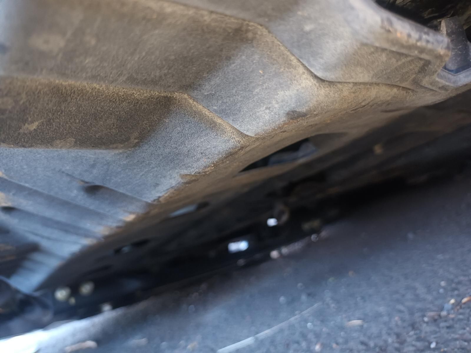 A Close Up of the Underside of a Car on the Ground — South West 4WD Wreckers in Harristown, QLD