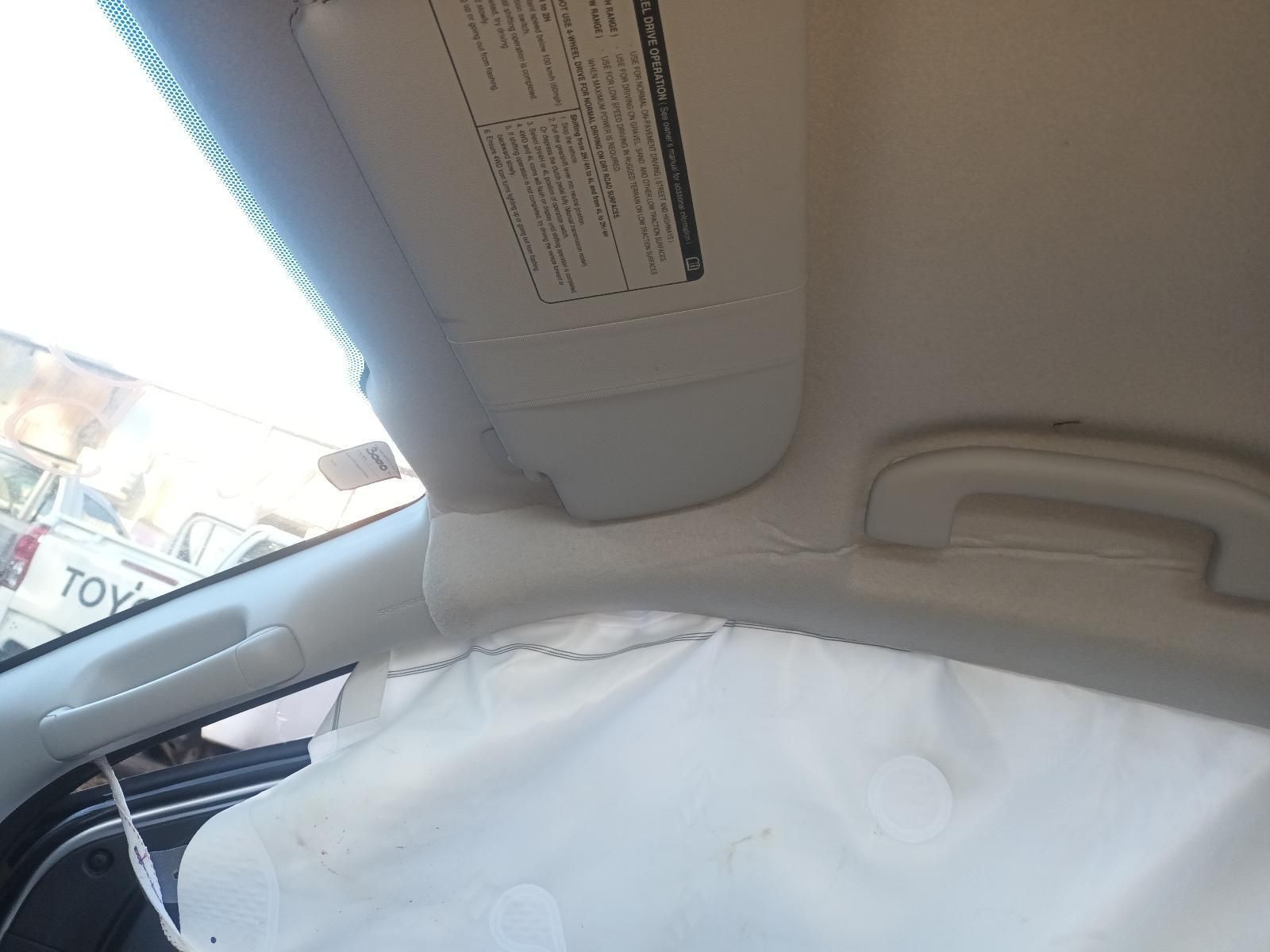 A Toyota Truck is Parked in the Background of a Car — South West 4WD Wreckers in Harristown, QLD