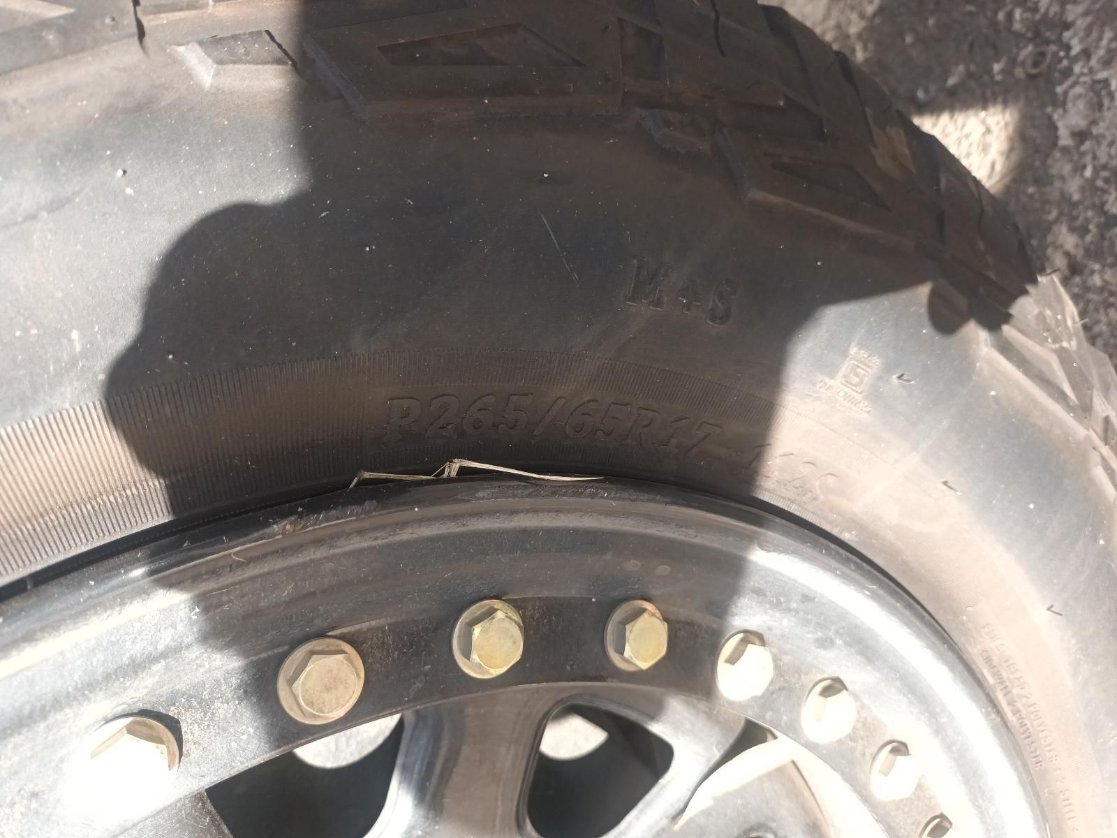 A Close Up of a Tire and Wheel on a Vehicle — South West 4WD Wreckers in Harristown, QLD