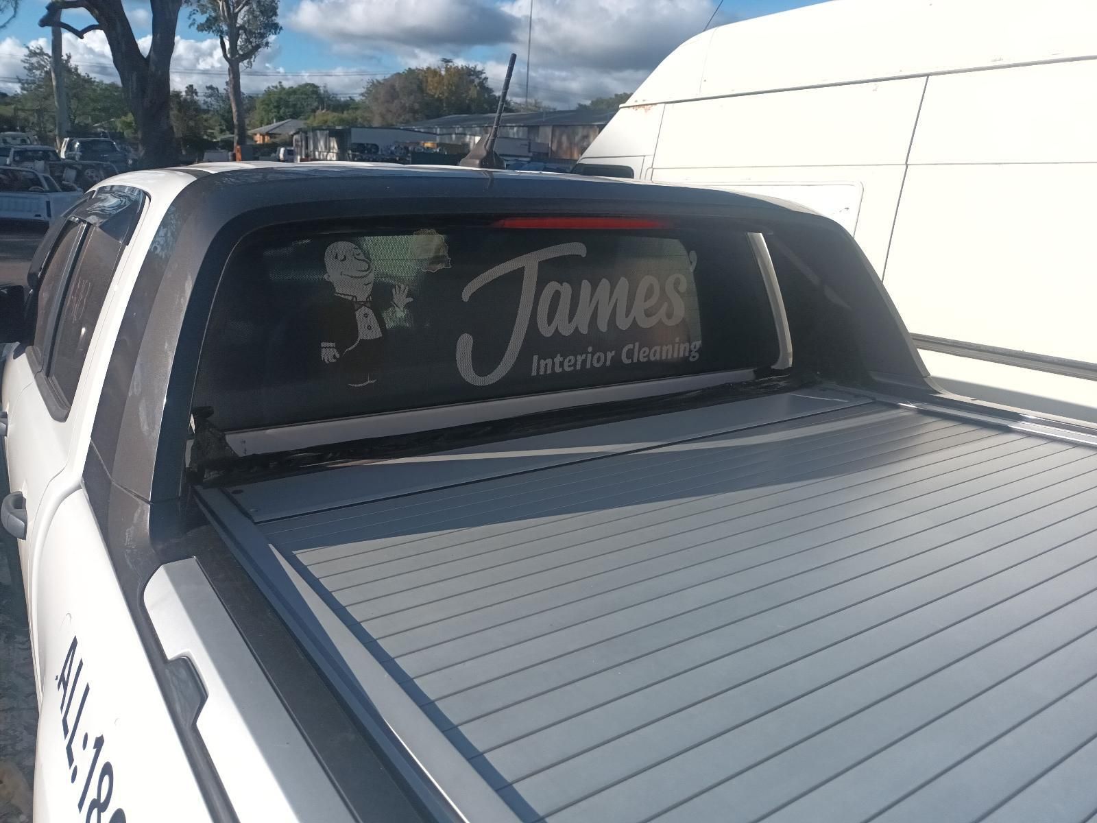 A White Truck with the Word James on the Back Window — South West 4WD Wreckers in Harristown, QLD