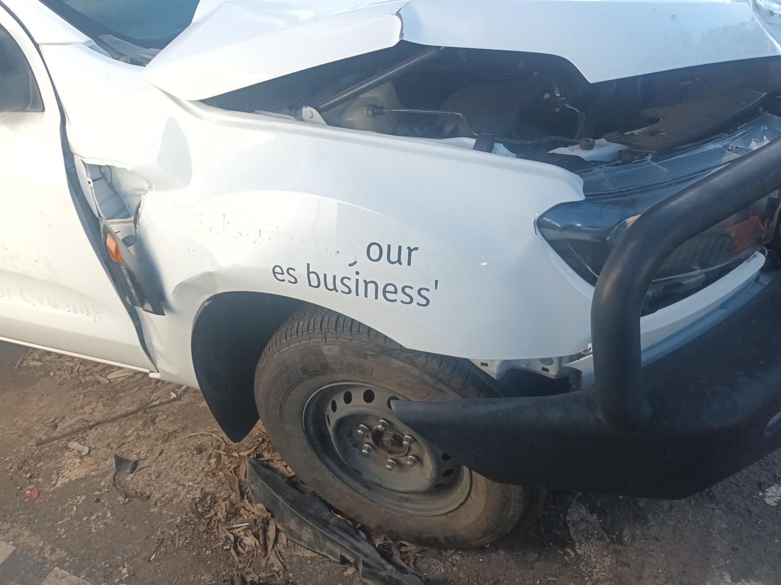 A White Truck with the Word Business on the Side of It — South West 4WD Wreckers in Harristown, QLD
