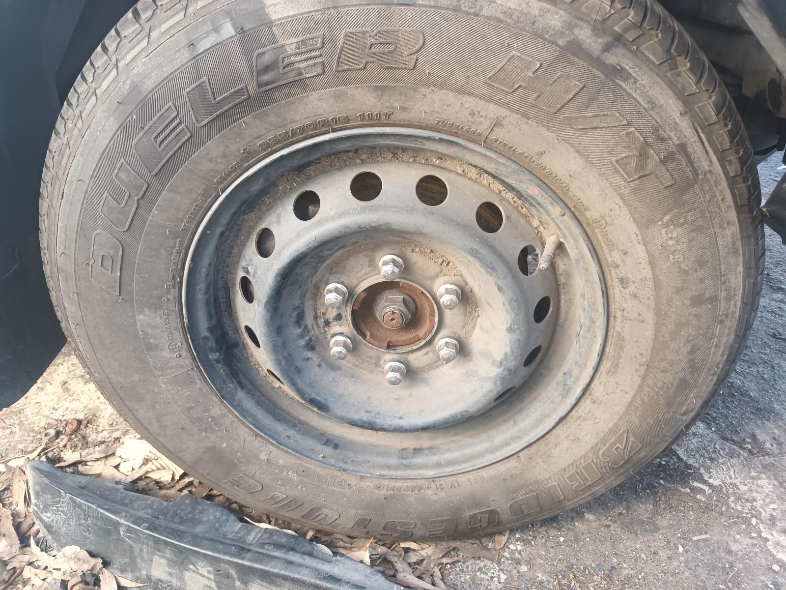 A Close Up of a Car Wheel with a Tire on It — South West 4WD Wreckers in Harristown, QLD