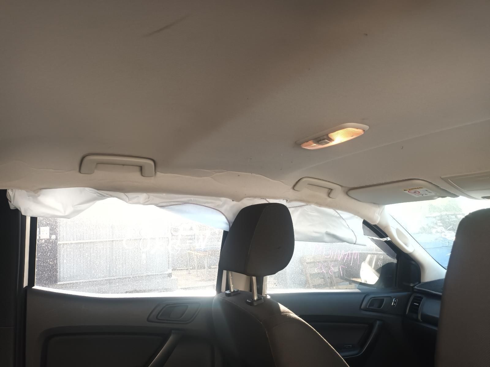 The Inside of a Car with a Roof That is Damaged — South West 4WD Wreckers in Harristown, QLD
