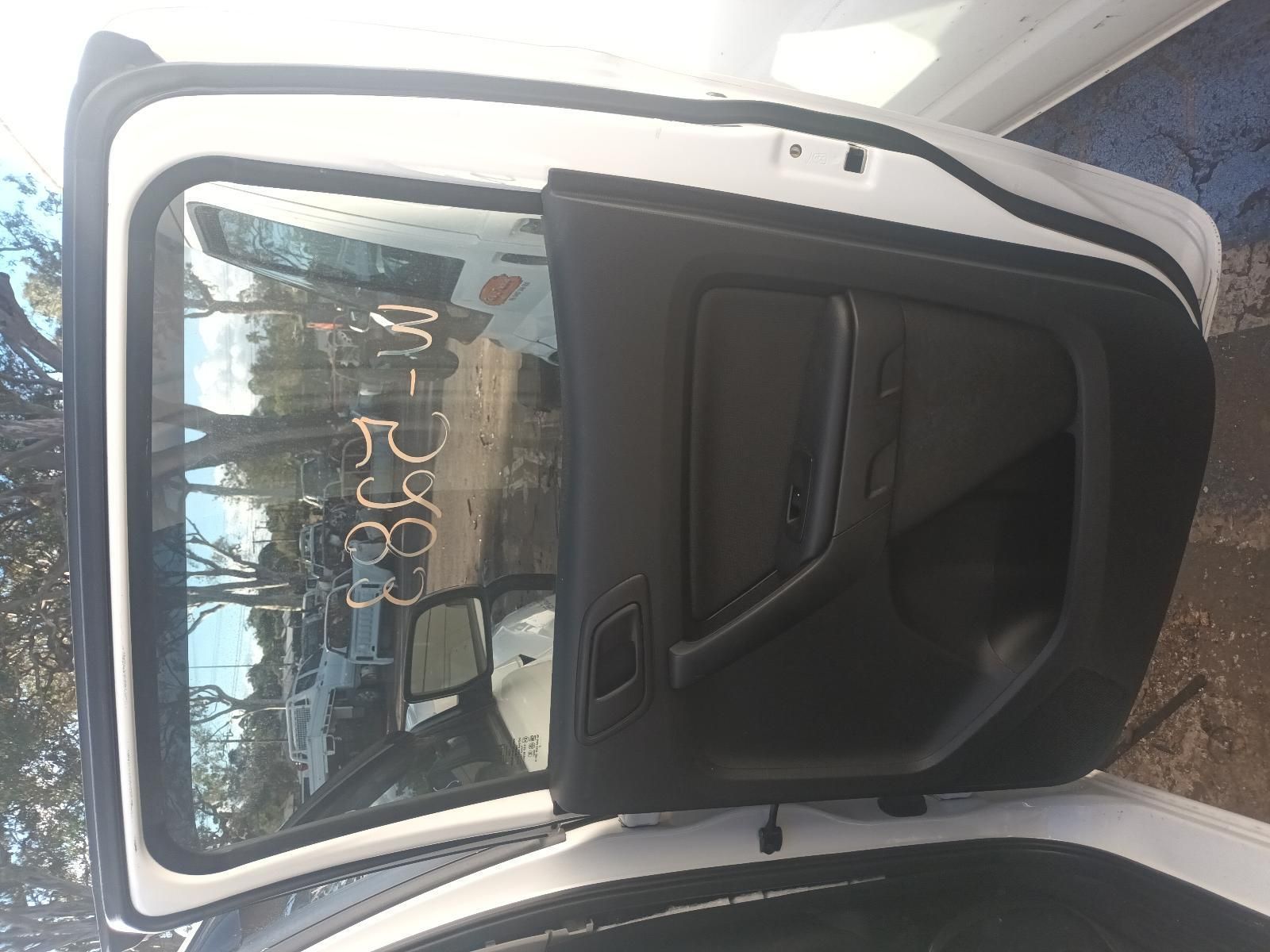 The Back Door of a White Car with the Door Open — South West 4WD Wreckers in Harristown, QLD