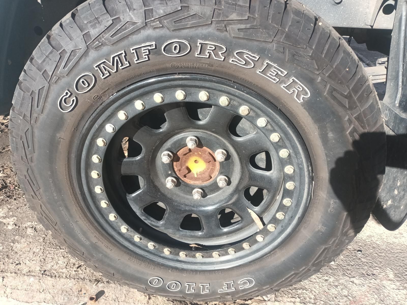A close up of a tire that says comforter on it