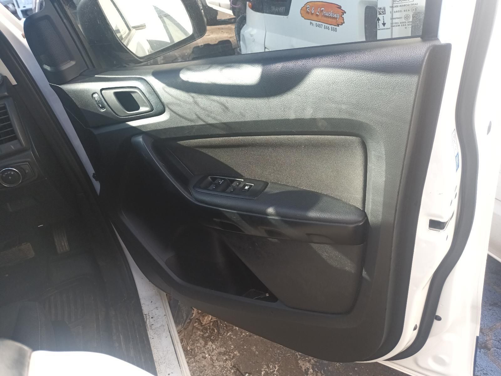 The Inside of a White Car with the Door Open — South West 4WD Wreckers in Harristown, QLD