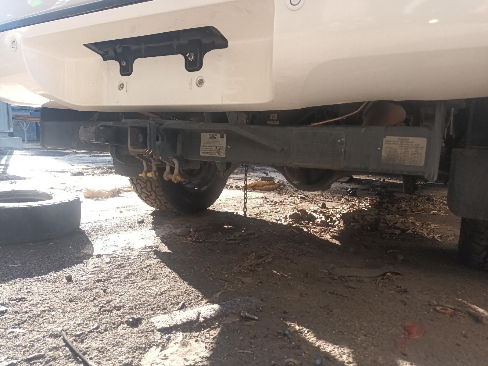A White Truck is Parked on a Dirt Road — South West 4WD Wreckers in Harristown, QLD