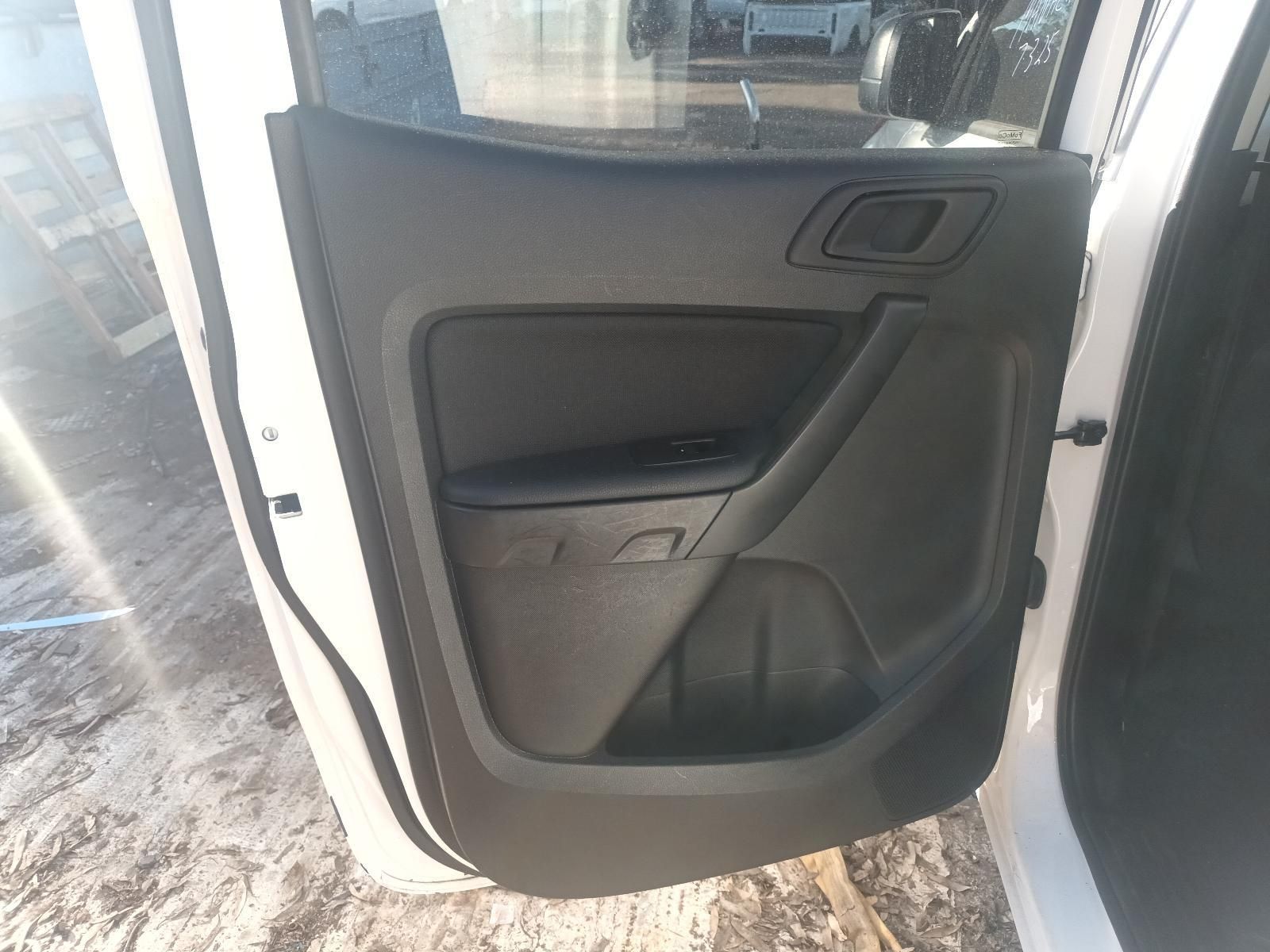 The Inside of a White Car with the Door Open — South West 4WD Wreckers in Harristown, QLD