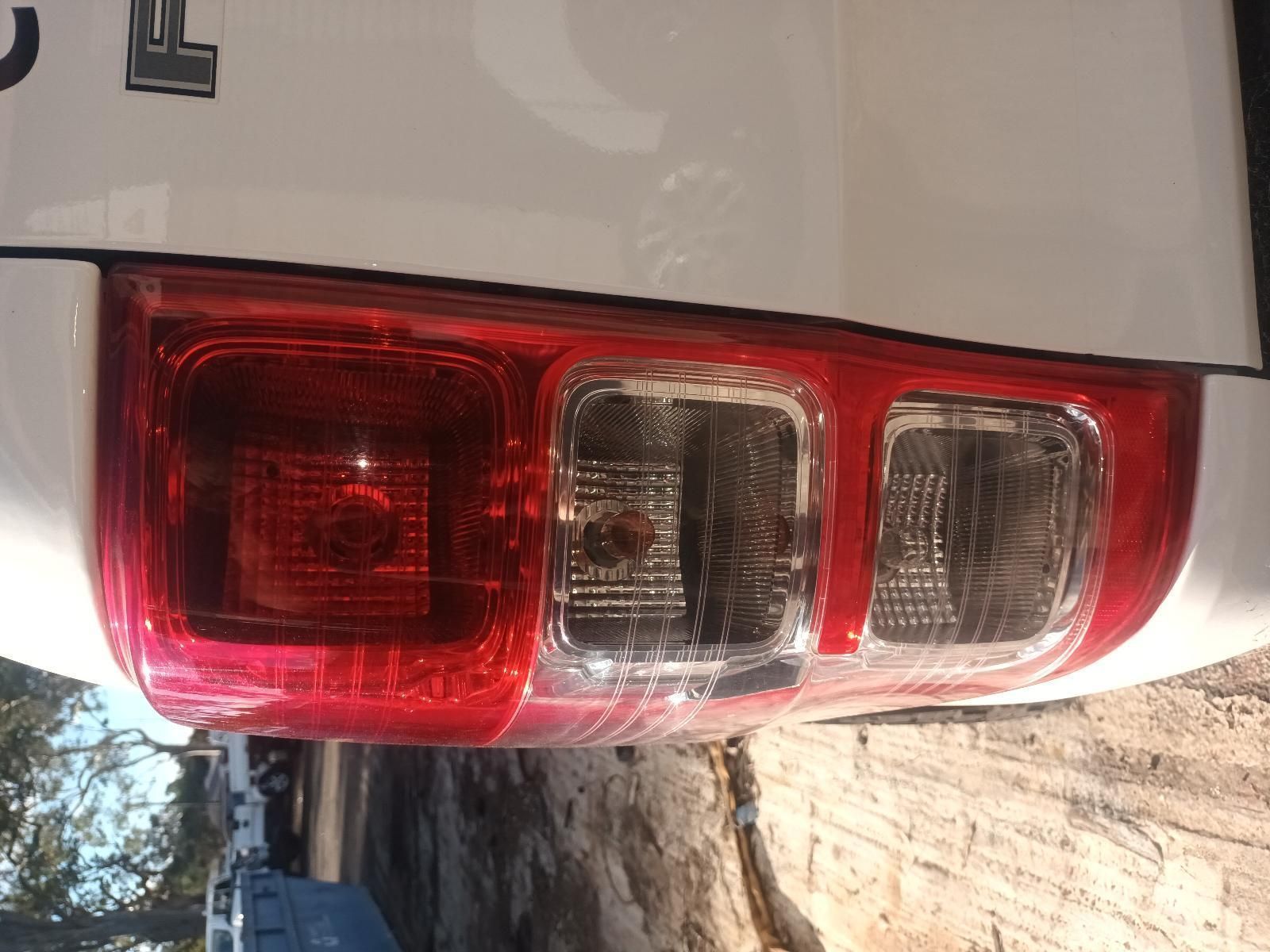 A Close Up of a Red Tail Light on a White Truck — South West 4WD Wreckers in Harristown, QLD