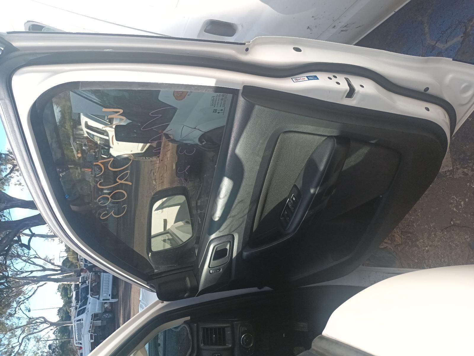 The Inside of a White Car with the Door Open — South West 4WD Wreckers in Harristown, QLD