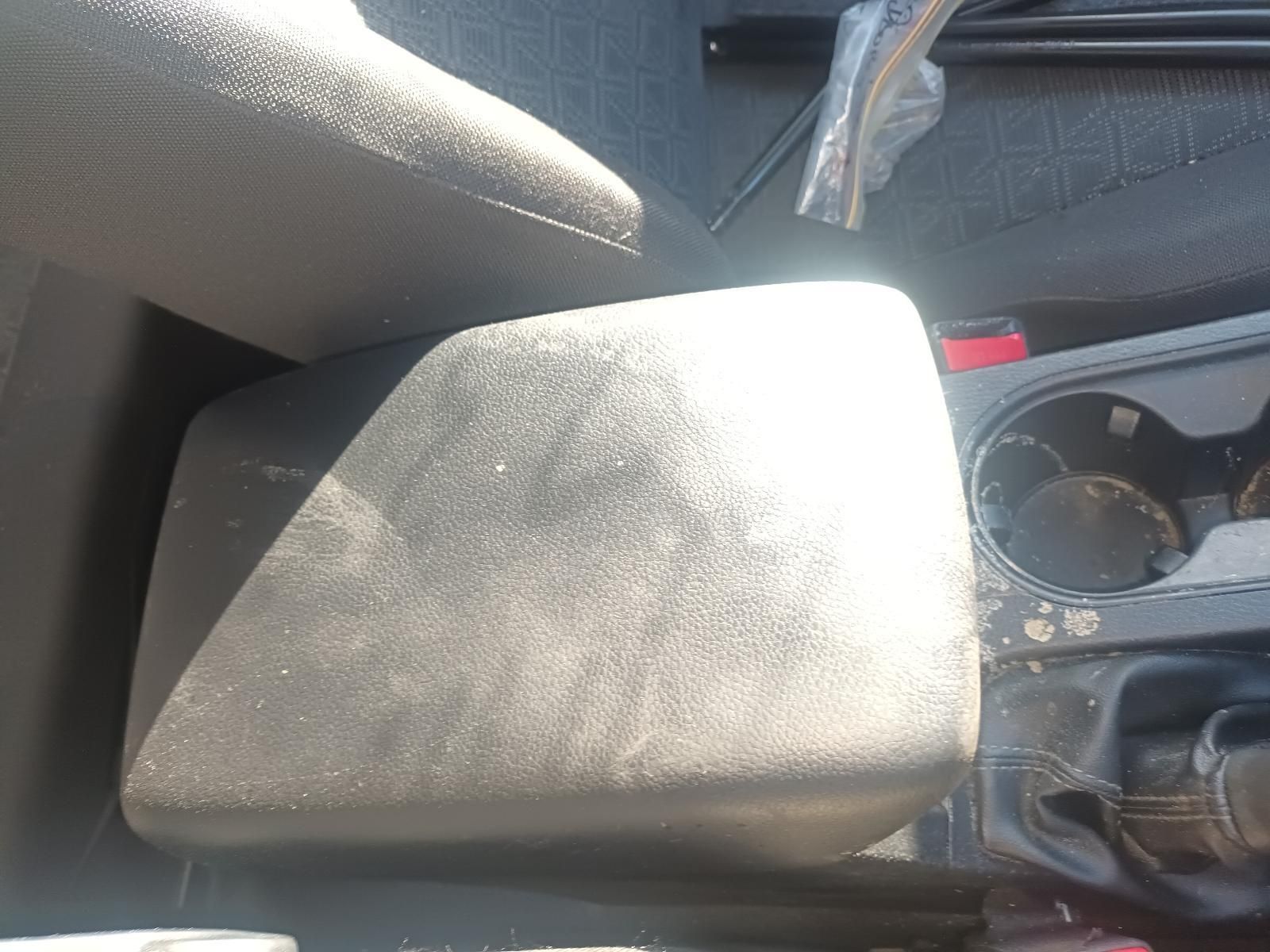 A Black Arm Rest in a Car with a Cup Holder — South West 4WD Wreckers in Harristown, QLD