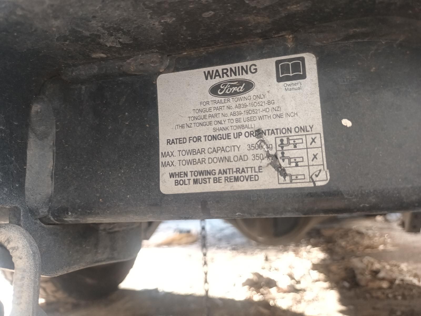 A Close Up of a Warning Label on a Ford Vehicle — South West 4WD Wreckers in Harristown, QLD