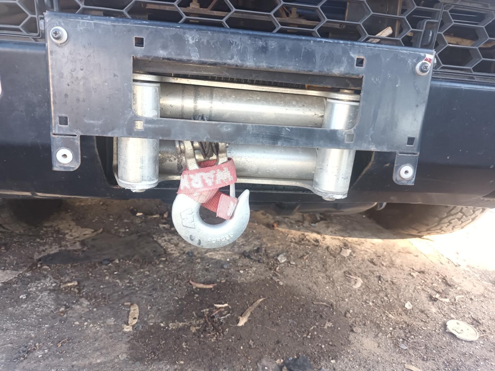 A Winch is Attached to the Bumper of a Car — South West 4WD Wreckers in Harristown, QLD