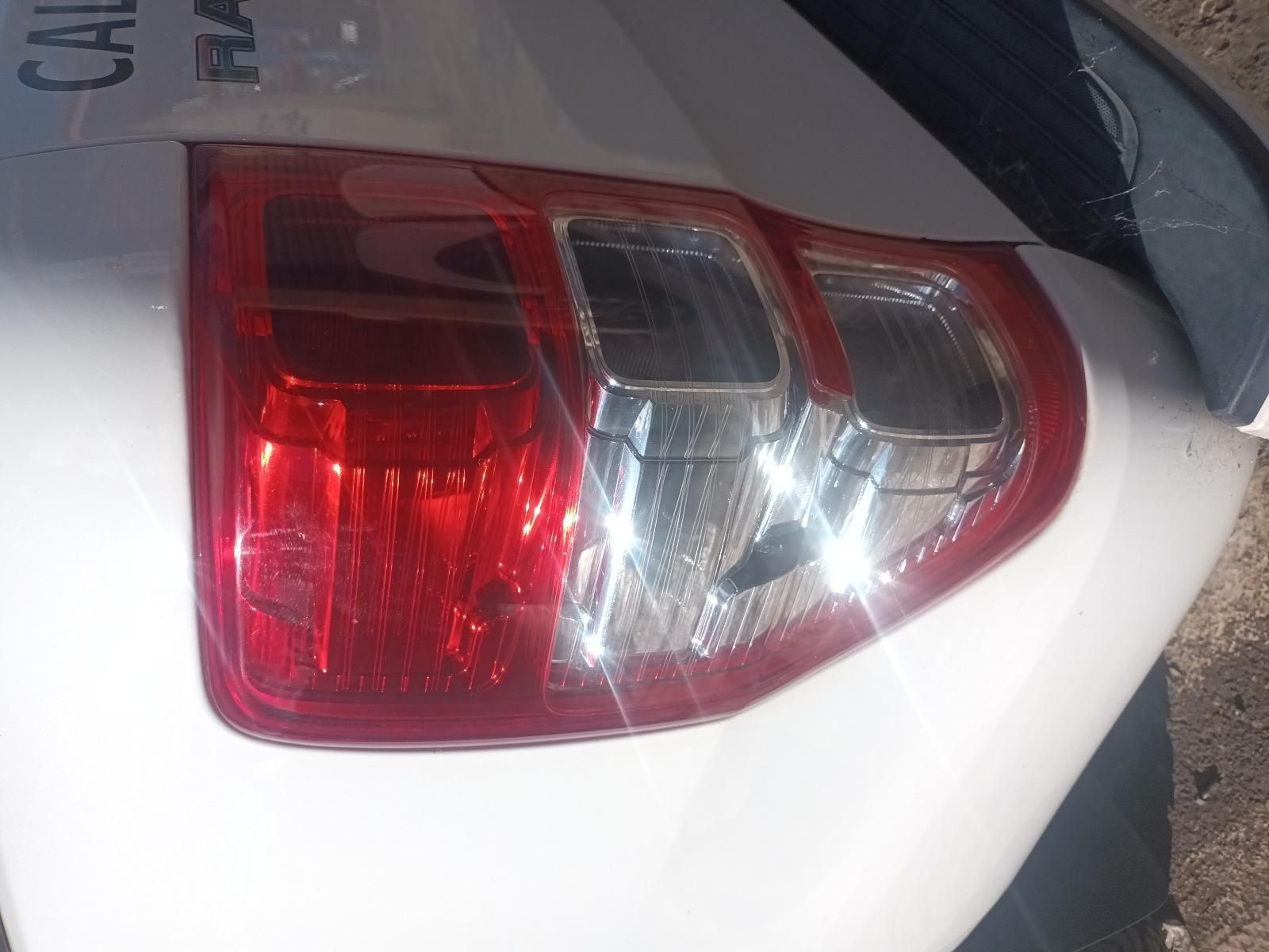 A White Car with a License Plate — South West 4WD Wreckers in Harristown, QLD